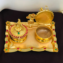 Golden Kumkum Box Set with Krishna Idols and Stone Embellishments  Description: