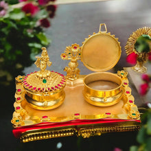 Golden Kumkum Box Set with Krishna Idols and Stone Embellishments  Description: