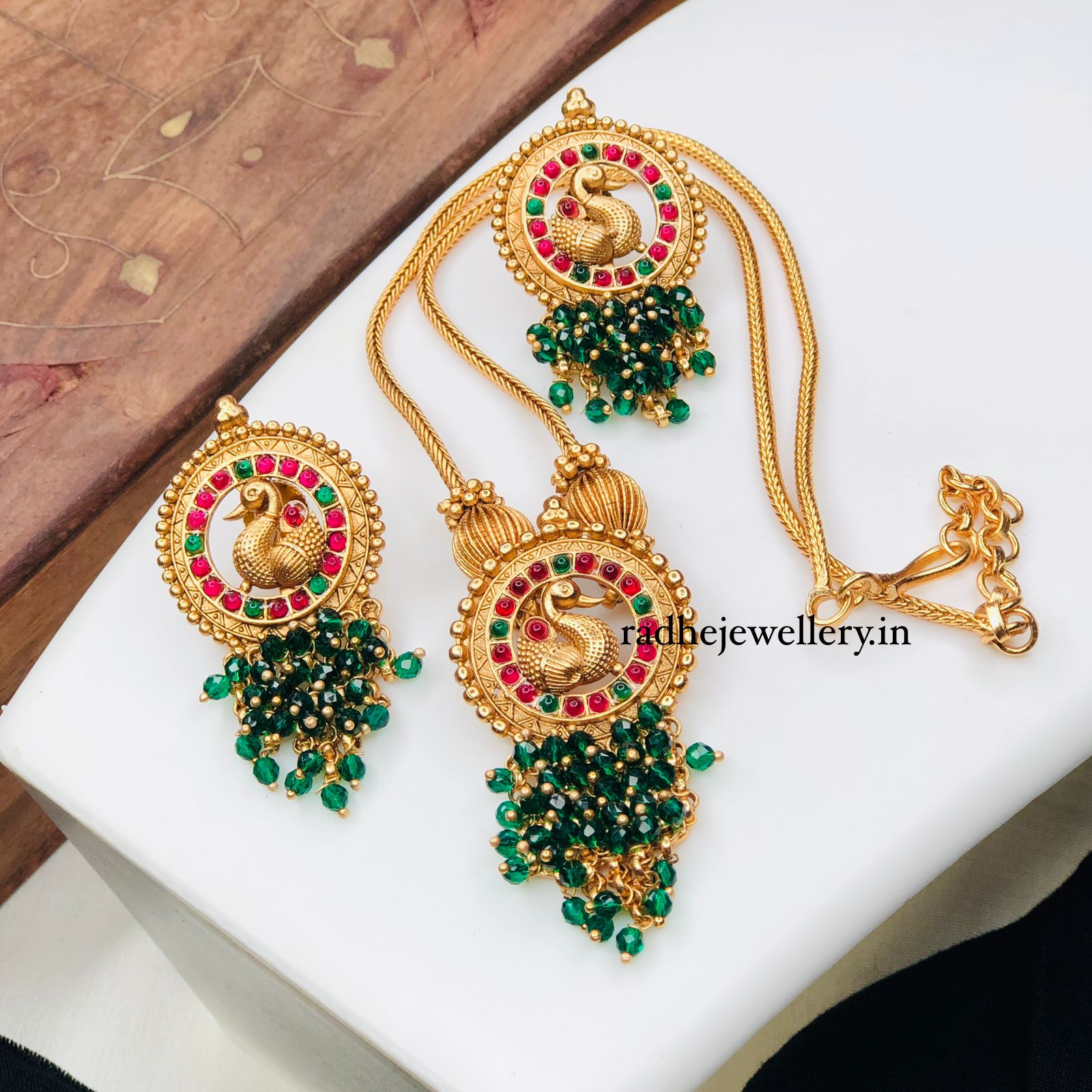 Matt gold peacock design pendant necklace set