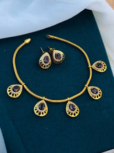 Premium Gold Finish Floral Necklace Set with Green Stone Pendant & Matching Earrings