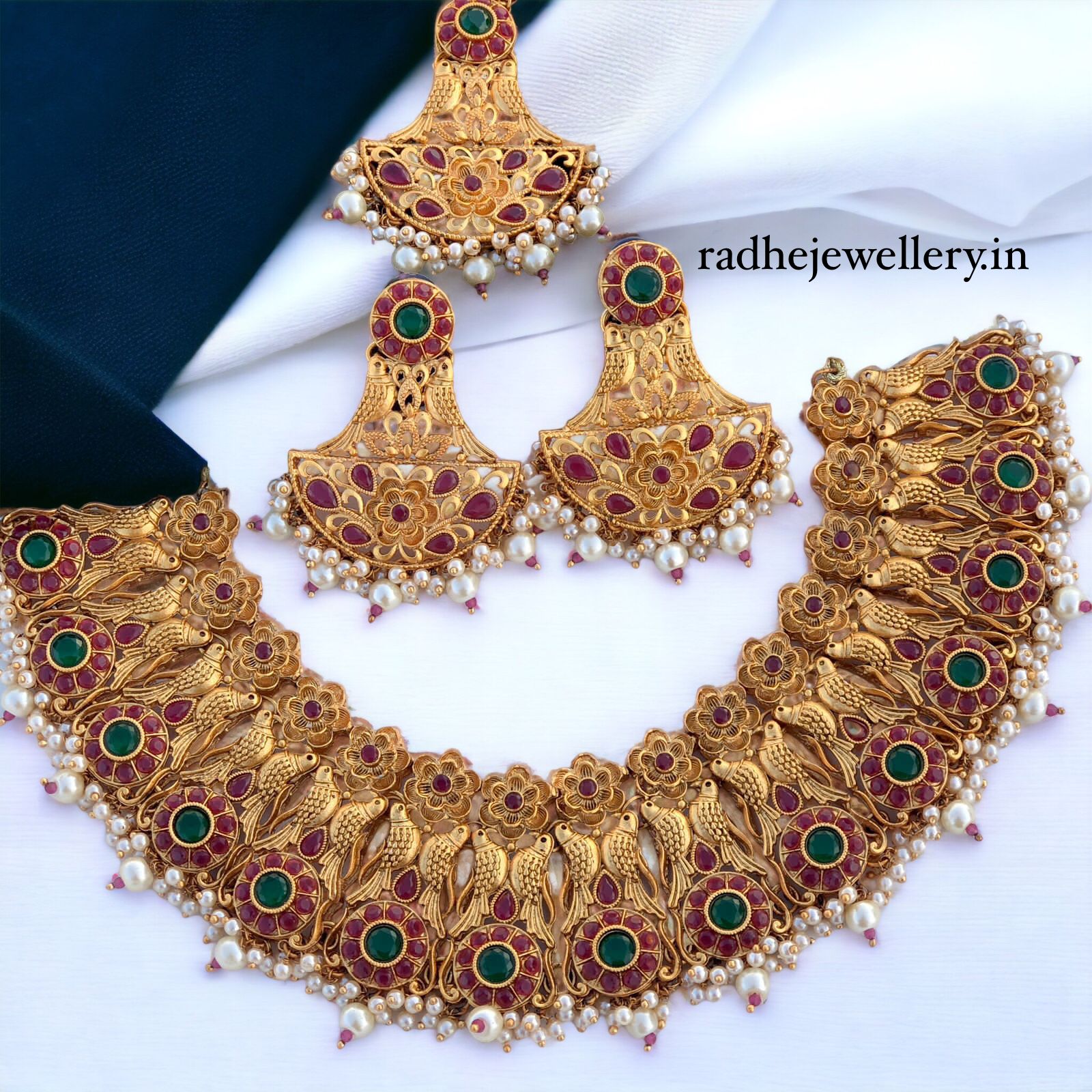 Sparrow Ruby Stone Neckpiece & earring and tikka set designs