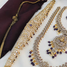 Royal Bridal Temple Jewellery Set with Layered Necklaces, Chandbali Earrings & Waist Belt – Gold Tone with Purple Bead
